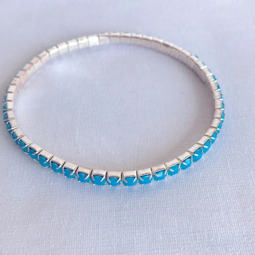 Turquoise color stone and silver tone bracelet